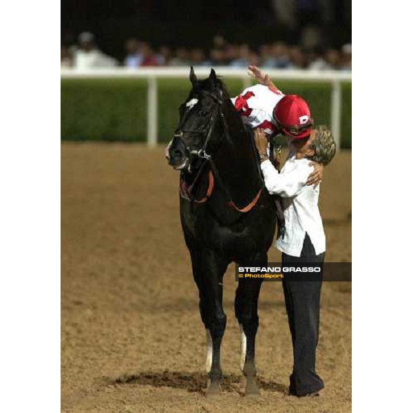 John Velazquez on Roses in May, winner of Dubai World Cup 2005, receive the congratulations from his wife. Nad El Sheba- Dubai, 26th march 2005 ph. Stefano Grasso