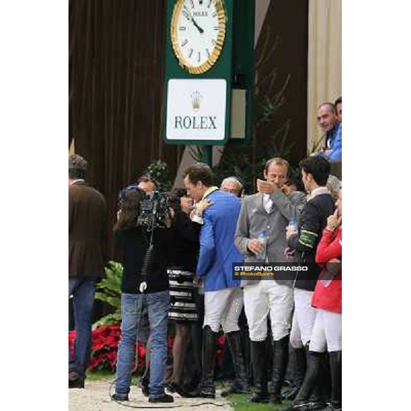 Eleonora Ottaviani congratulates with Christian Ahlmann Top 10 Rolex IJRC Geneve,7th dec.2012 ph.IJRC/StefanoGrasso