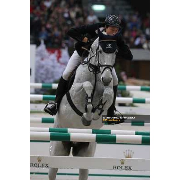 Martin Fuchs on Principal 12 Grand Prix Rolex Rolex Fei World Cup Geneve,9th dec.2012 ph.IJRC/StefanoGrasso