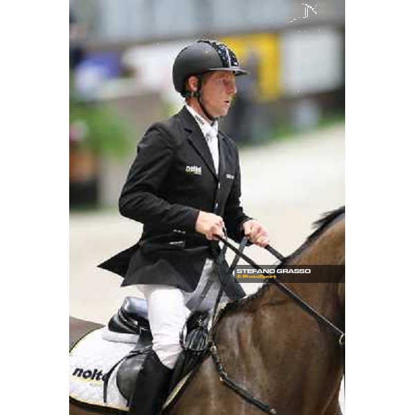 Marcus Ehning on Noltes Kuchengirl Grand Prix Rolex Rolex Fei World Cup Geneve,9th dec.2012 ph.IJRC/StefanoGrasso