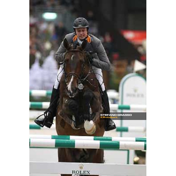 Marco Kutscher on Spartacus TN Grand Prix Rolex Rolex Fei World Cup Geneve,9th dec.2012 ph.IJRC/StefanoGrasso