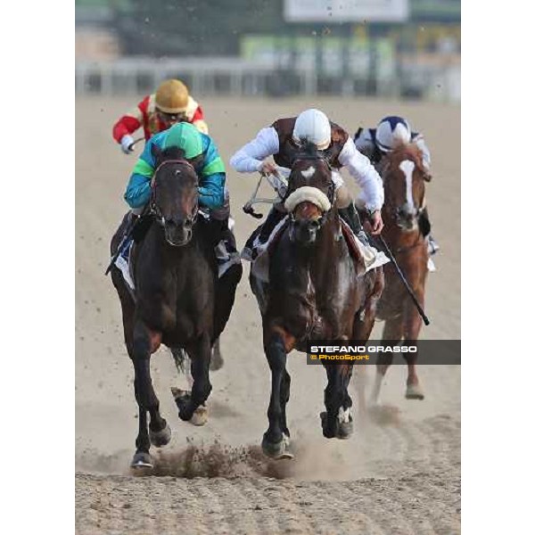 Andrea Atzeni on Dogma Noir wins the Premio Unire beating Cristian Demuro on Bacchelli Rome - Capannelle racecourse,23rd dec.2012 ph.Stefano Grasso