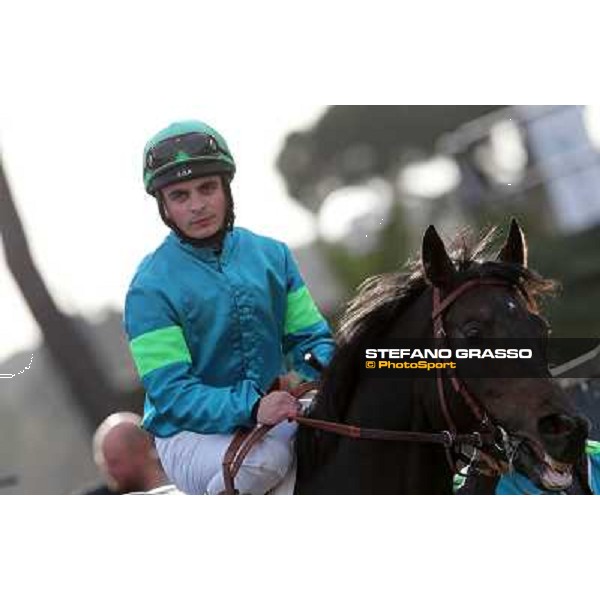 Andrea Atzeni on Dogma Noir enters the track before winning the Premio Unire Rome - Capannelle racecourse,23rd dec.2012 ph.Stefano Grasso