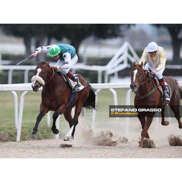 Davide Satalia on Holy Balet goes to win the Premio Riccardo Agriformi followed by Giovanni Parri on Kecek Rome, Capannelle racecourse, 12th january 2013 ph.Stefano Grasso