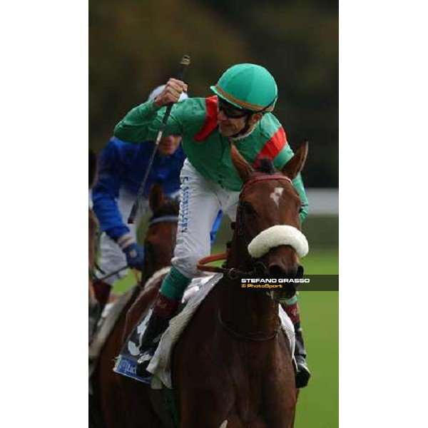 \'Christophe Soumillon exulting on Behkara, owner S.A. Aga Khan, after winning Prix Hubert de Chaudenay Casino Barriere de Menton Paris, Hippodrome de Longchamp oct. 4 2003-ph.Stefano Grasso\' 