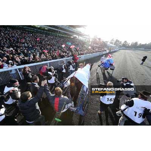 Jean Philippe Dubois ,Royal Dream and their winning connection parade after the triumph in the Grand Prix d\'Amerique Paris - Vincennes racecourse,27th january 2013 ph.Stefano Grasso