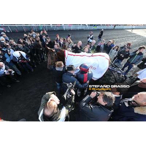 Jean Philippe Dubois ,Royal Dream and their winning connection parade after the triumph in the Grand Prix d\'Amerique Paris - Vincennes racecourse,27th january 2013 ph.Stefano Grasso
