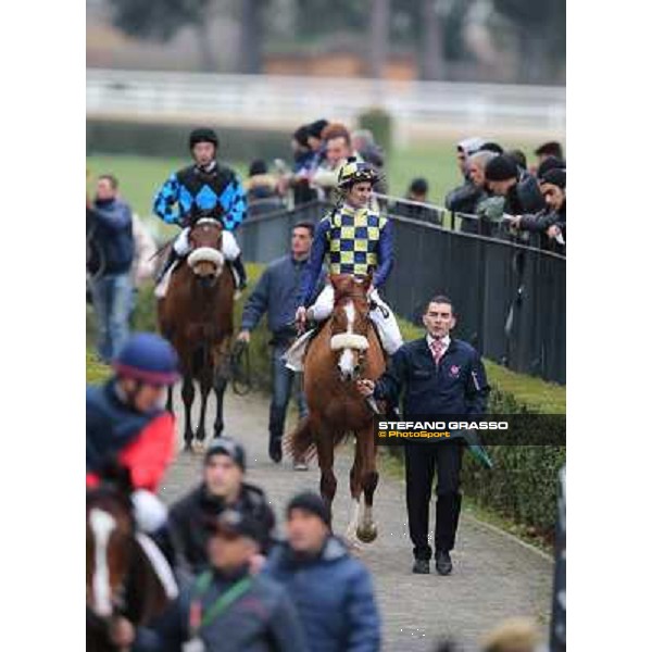 Charity Line,Fabio Branca up, Stefano Botti and Jonathan Bacci after winning the Premio Nannoccia Roma - Capannelle racecourse, 17th march 2013 ph.Stefano Grasso