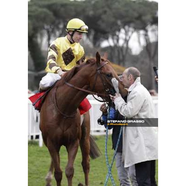 Gianluca with Gabriele Bietolini on Gordol du Mes celebrates after winning the 123° Premio Pisa Pisa, San Rossore racecourse,24th march 2013 ph.Stefano Grasso