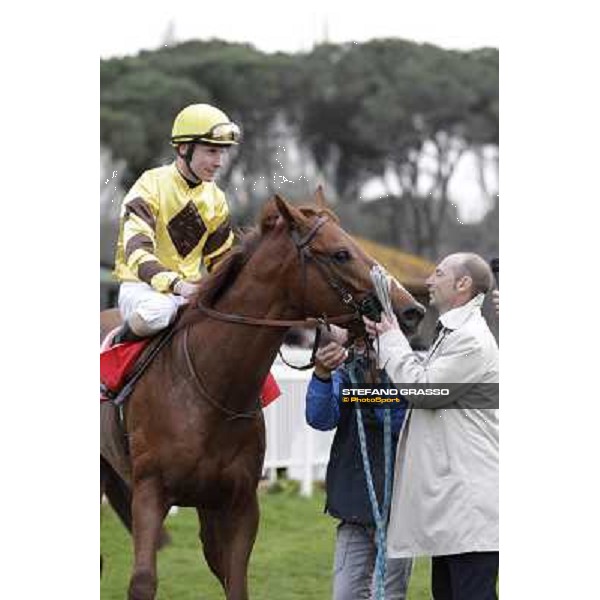 Gianluca with Gabriele Bietolini on Gordol du Mes celebrates after winning the 123° Premio Pisa Pisa, San Rossore racecourse,24th march 2013 ph.Stefano Grasso