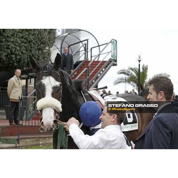 Vedelago,Stefano Botti and his groom after winning the Premio Gentlewave Rome - Capannelle racecourse,1st april 2013 ph.Stefano Grasso