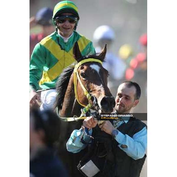 Michele Colombi on Bettolle returns home after winning the Premio Carlo Chiesa - Trofeo Jill Pratt Rome - Capannelle racecourse,14th april 2013 ph.Stefano Grasso
