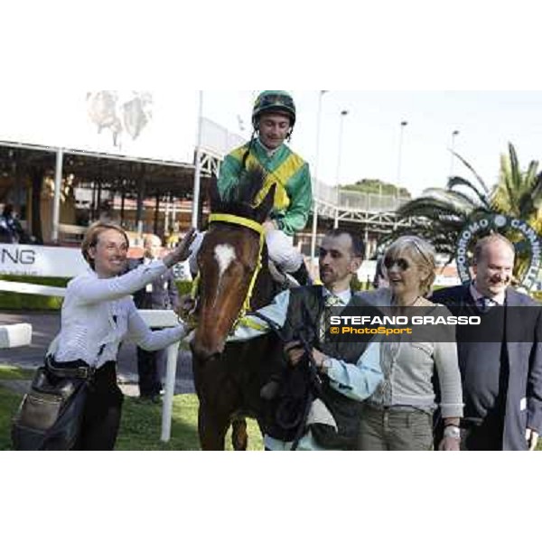 Michele Colombi on Bettolle with his winning connection enter the winner enclosure of Premio Carlo Chiesa Rome - Capannelle racecourse,14th april 2013 ph.Stefano Grasso