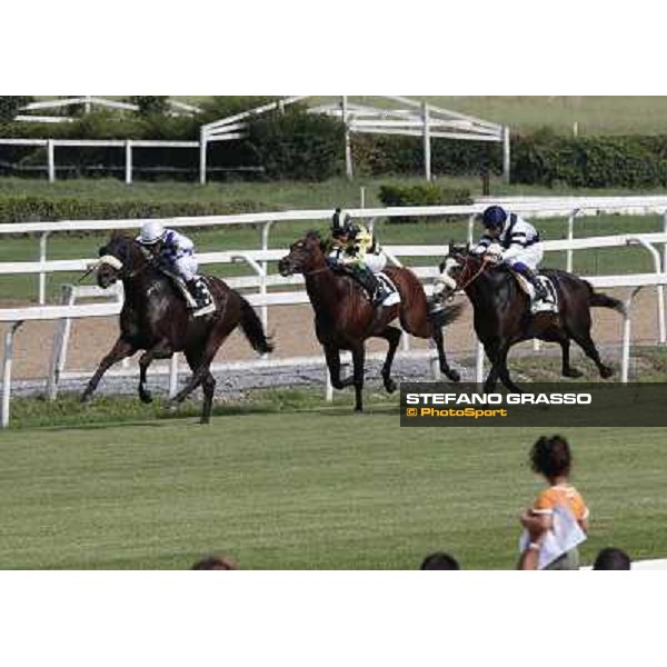 Carlo Fiocchi and Principe Adepto go to win the Premio Festuca beating Vedelago and Passaggio Rome,Capannelle racecourse,8th sept.2013 ph.Stefano Grasso