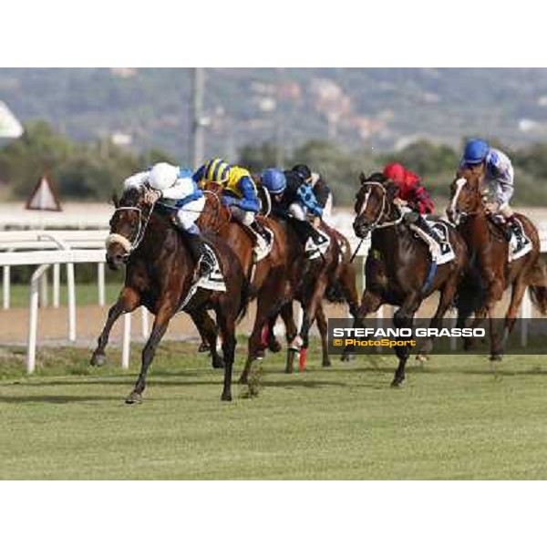 Maurizio Pasquale and Valvibrata win the Premio Handicap d\'Autunno Rome,Capannelle racecourse,8th sept.2013 ph.Stefano Grasso