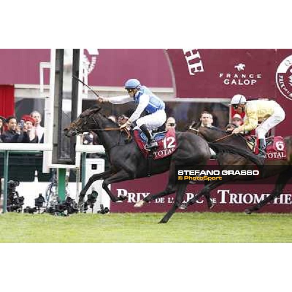F.Prat with Indonesienne wins the Total Prix Marcel Boussac Paris,Longchamp racecourse,6th oct.2013 ph.Stefano Grasso