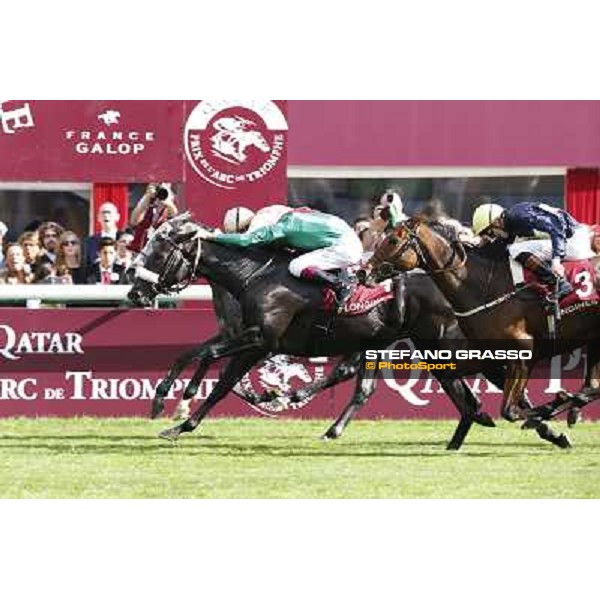 Christophe Soumillon and Dalkala win the Prix de l\'Opera Longines Paris,Longchamp racecourse,6th oct,2013 ph.Stefano Grasso