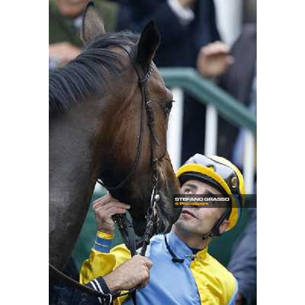 Dario Vargiu and Ombrage in the winner enclosure of the Premio Dormello Milano.San Siro racecourse,20th oct.2013 ph.Stefano Grasso