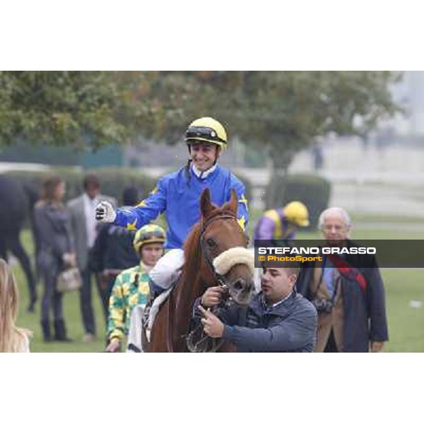 Carlo Fiocchi and Delrock after winning the Premio Carlo Porta Milano,San Siro racecourse,20th oct.2013 ph.Stefano Grasso