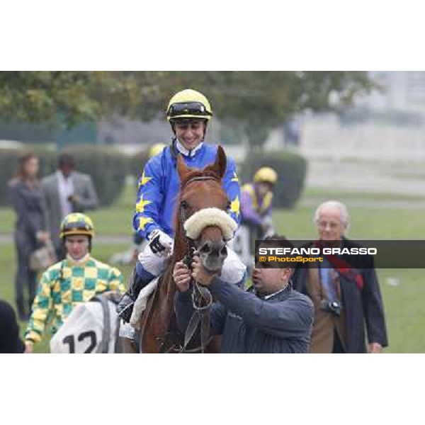 Carlo Fiocchi and Delrock after winning the Premio Carlo Porta Milano,San Siro racecourse,20th oct.2013 ph.Stefano Grasso