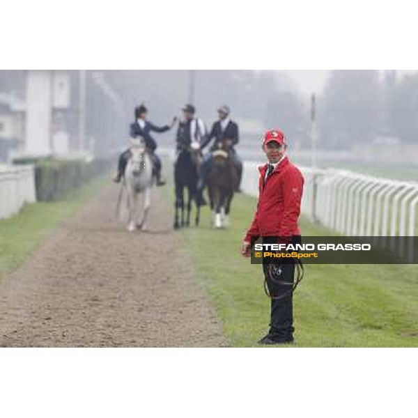 Cristian Demuro and Nabucco with Peter Franceschini and his groom after winning the Premio del Piazzale Milano,San Siro racecourse,20th oct.2013 ph.Stefano Grasso