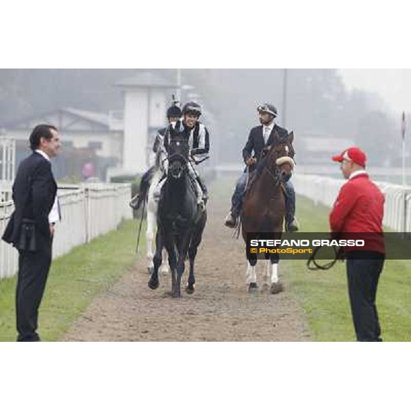 Cristian Demuro and Nabucco with Peter Franceschini and his groom after winning the Premio del Piazzale Milano,San Siro racecourse,20th oct.2013 ph.Stefano Grasso
