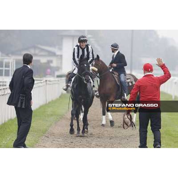 Cristian Demuro and Nabucco with Peter Franceschini and his groom after winning the Premio del Piazzale Milano,San Siro racecourse,20th oct.2013 ph.Stefano Grasso