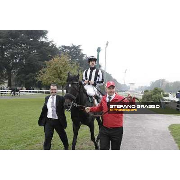 Cristian Demuro on Nabucco with Peter Franceschini and the groom after winning the Premio del Piazzale Milano,San Siro racecourse,20th oct.2013 ph.Stefano Grasso