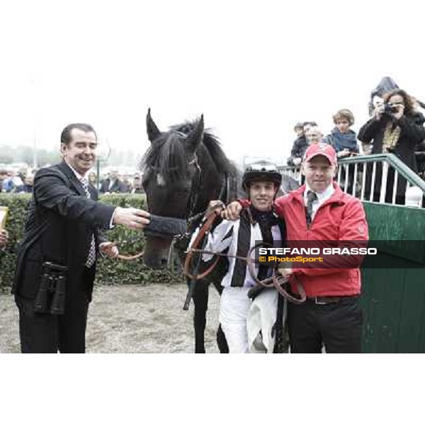 Cristian Demuro on Nabucco with Peter Franceschini and the groom after winning the Premio del Piazzale Milano,San Siro racecourse,20th oct.2013 ph.Stefano Grasso