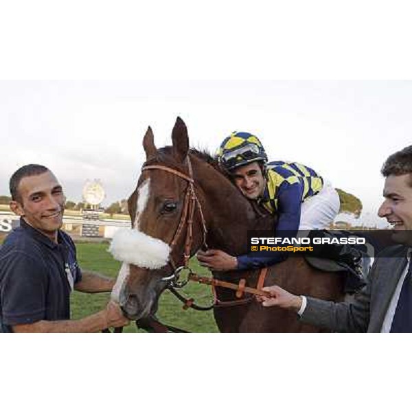 Fabio Branca,Charity Line with her groom and Stefano Botti after winning the Gran Premio Longines Lydia Tesio Rome, Capannelle racecourse,27th oct.2013 ph.Stefano Grasso