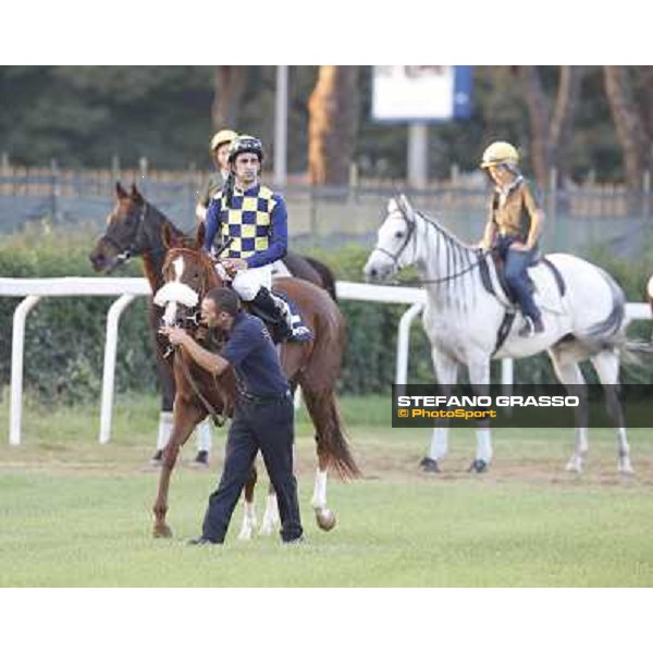 Fabio Branca and Charity Line after winning the Gran Premio Longines Lydia Tesio Rome, Capannelle racecourse,27th oct.2013 ph.Stefano Grasso