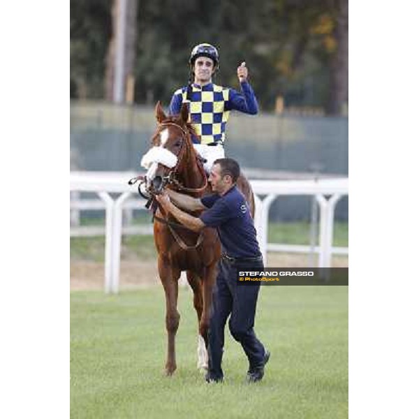 Fabio Branca and Charity Line after winning the Gran Premio Longines Lydia Tesio Rome, Capannelle racecourse,27th oct.2013 ph.Stefano Grasso