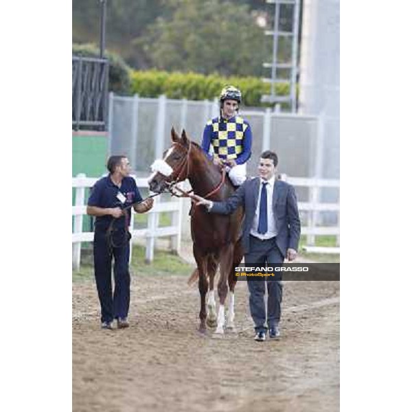 Fabio Branca,Stefano Botti and Charity Line after winning the Gran Premio Longines Lydia Tesio Rome, Capannelle racecourse,27th oct.2013 ph.Stefano Grasso