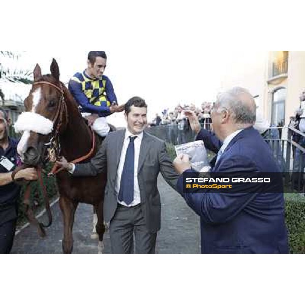 Fabio Branca,Stefano Bottti,Felice Villa and Charity Line after winning the Gran Premio Longines Lydia Tesio Rome, Capannelle racecourse,27th oct.2013 ph.Stefano Grasso