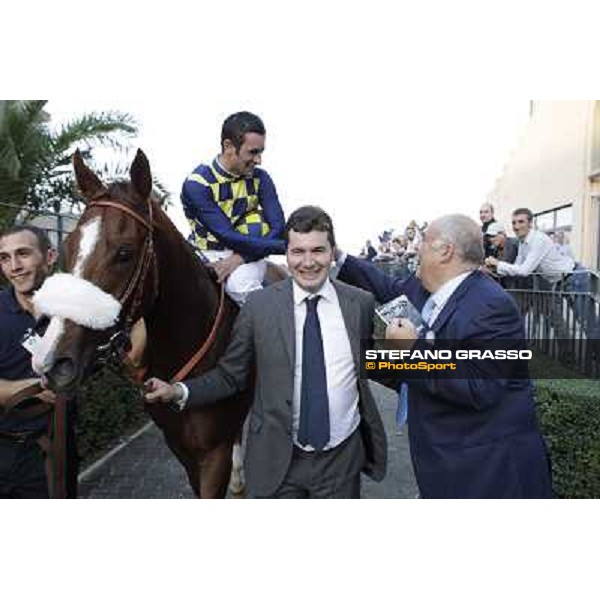 Fabio Branca,Stefano Bottti,Felice Villa and Charity Line after winning the Gran Premio Longines Lydia Tesio Rome, Capannelle racecourse,27th oct.2013 ph.Stefano Grasso