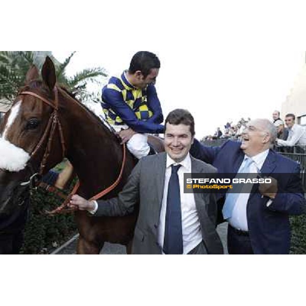 Fabio Branca,Stefano Bottti,Felice Villa and Charity Line after winning the Gran Premio Longines Lydia Tesio Rome, Capannelle racecourse,27th oct.2013 ph.Stefano Grasso