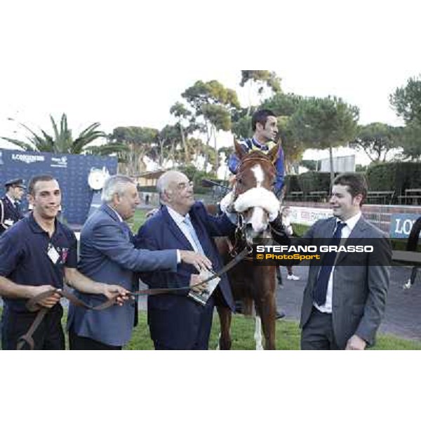 Fabio Branca,Felice Villa,Stefano Bottti and Charity Line after winning the Gran Premio Longines Lydia Tesio Rome, Capannelle racecourse,27th oct.2013 ph.Stefano Grasso