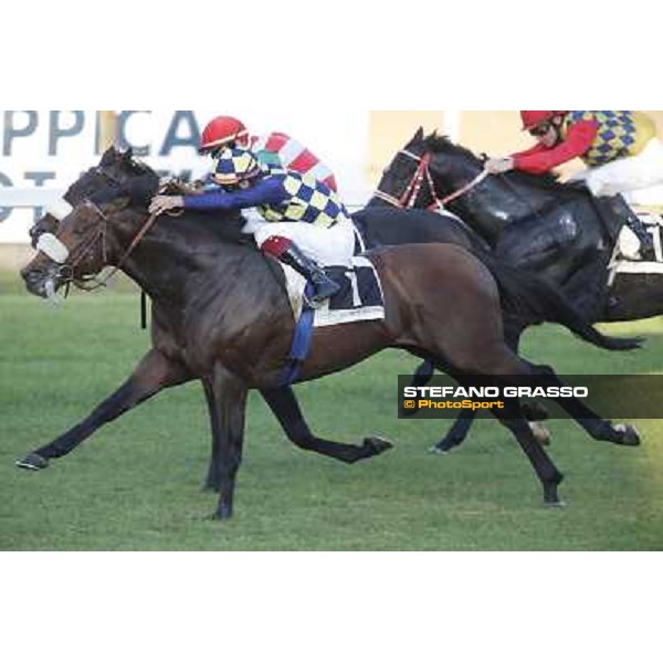 Fabio Branca on Douce Vie goes to win the Premio Nearco beating Candiani Street and Rimbaud Roma,Capannelle racecourse,27th oct.2013 ph.Stefano Grasso