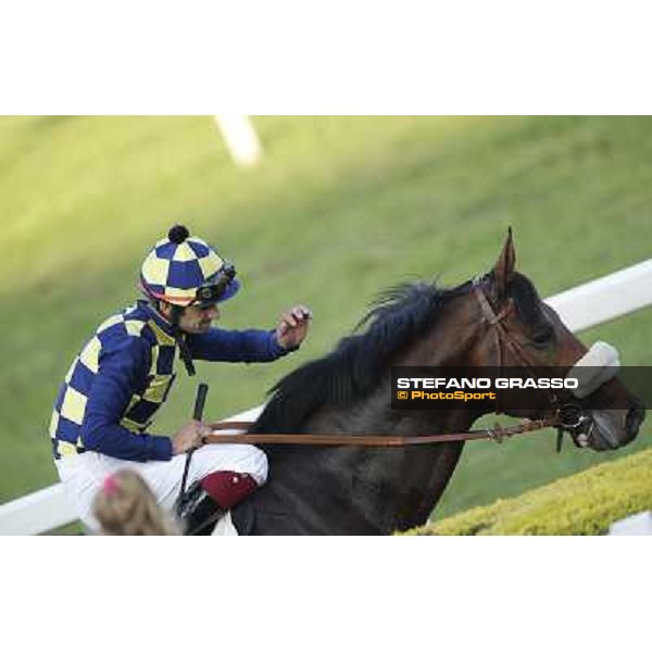 Fabio Branca on Douce Vie returns home after winning the Premio Nearco Roma,Capannelle racecourse,27th oct.2013 ph.Stefano Grasso