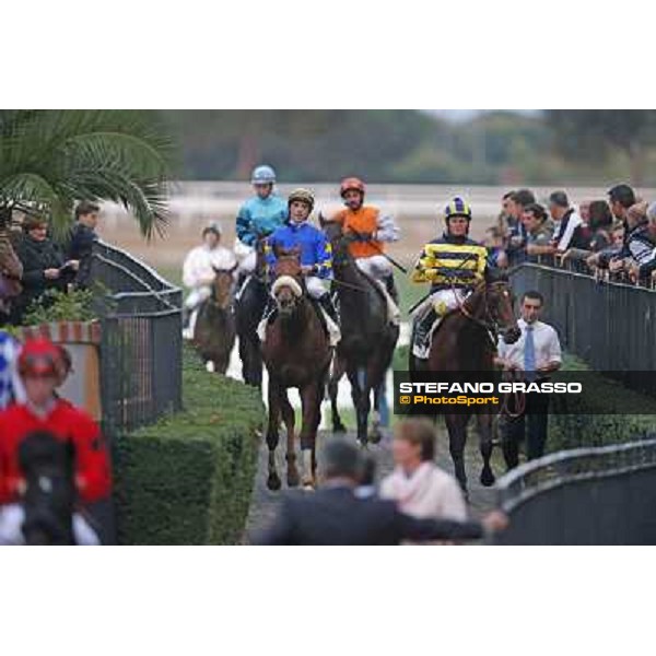Jockeys and horses return home Premio Ribot Roma,Capannelle racecourse,3rd nov.2013 ph.Stefano Grasso