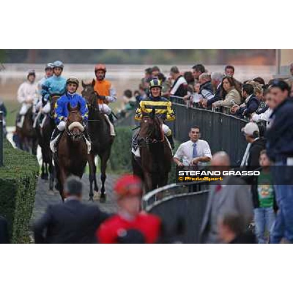 Jockeys and horses return home Premio Ribot Roma,Capannelle racecourse,3rd nov.2013 ph.Stefano Grasso