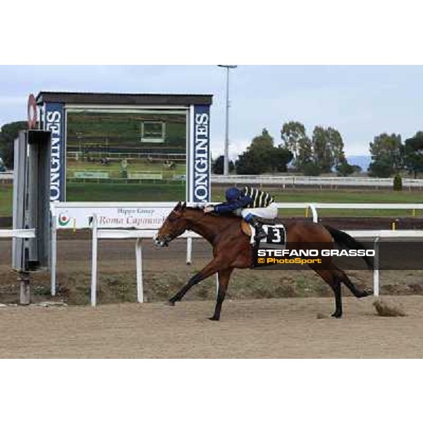 Francesco Dettori and Jyoti win the Premio Pentotal Roma - Capannelle racecourse,2nd march 2014 ph.Domenico Savi/Grasso
