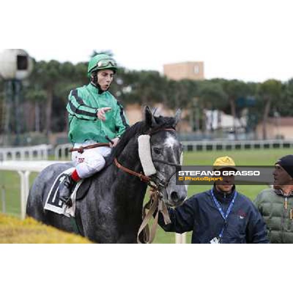 Antonio Fresu and Makarenko after winning the Premio Optional Roma - Capannelle racecourse,2nd march 2014 ph.Domenico Savi/Grasso