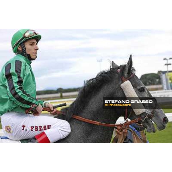 Antonio Fresu and Makarenko after winning the Premio Optional Roma - Capannelle racecourse,2nd march 2014 ph.Domenico Savi/Grasso