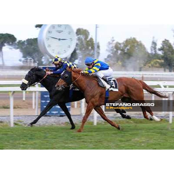 Fabio Branca on Romantic Wave wins the Premio Sirlad beating Cristian Demuro on Refuse to Bobbin Rome - Capannelle racecourse,9th march 2014 ph.Domenico Savi/Grasso