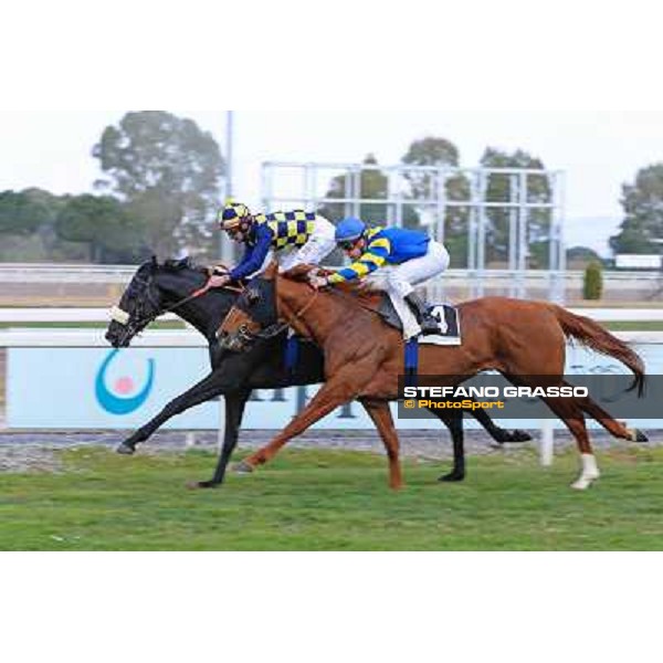 Fabio Branca on Romantic Wave wins the Premio Sirlad beating Cristian Demuro on Refuse to Bobbin Rome - Capannelle racecourse,9th march 2014 ph.Domenico Savi/Grasso