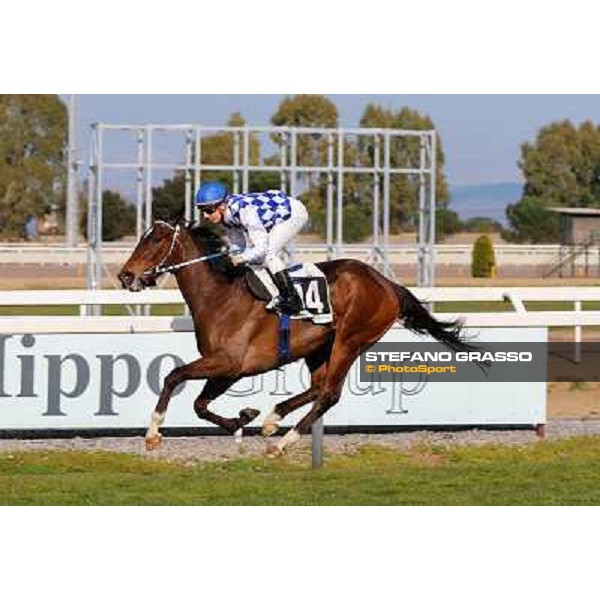 Cristian Demuro on Ronana wins the Premio Fidalgo Rome - Capannelle racecourse,9th march 2014 ph.Domenico Savi/Grasso