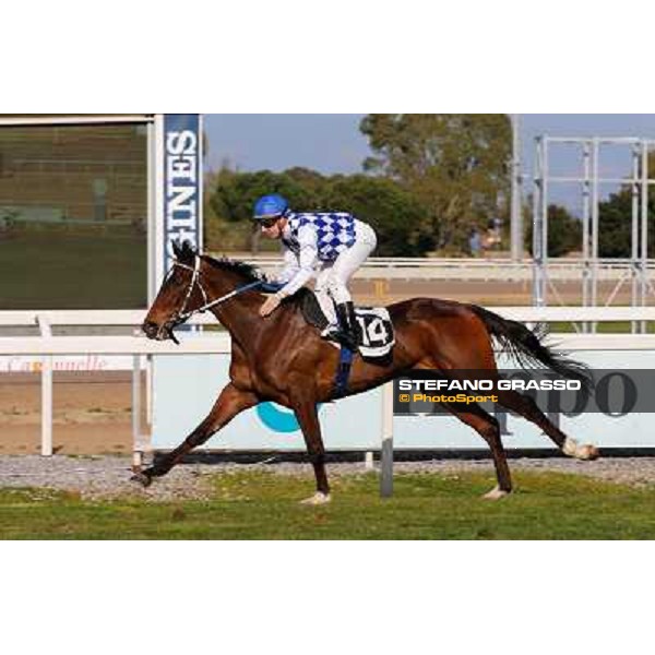 Cristian Demuro on Ronana wins the Premio Fidalgo Rome - Capannelle racecourse,9th march 2014 ph.Domenico Savi/Grasso