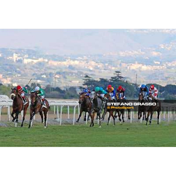 Antonio Fresu on Svatantra wins the Premio Federico Smith beating Carlo Fiocchi on Cleo Fan Rome - Capannelle racecourse,9th march 2014 ph.Domenico Savi/Grasso