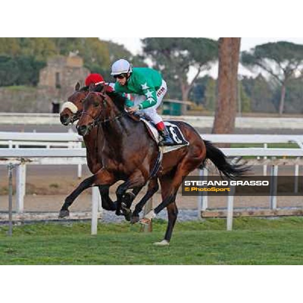 Antonio Fresu on Svatantra wins the Premio Federico Smith beating Carlo Fiocchi on Cleo Fan Rome - Capannelle racecourse,9th march 2014 ph.Domenico Savi/Grasso